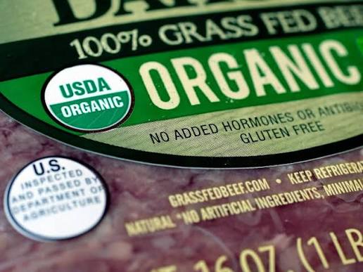 Various food certification seals like USDA Organic, Non-GMO